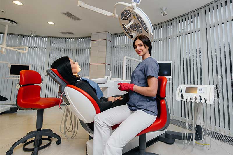 Dentist smiling while treatments